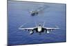 An F-A-18E Super Hornet Flying Above USS John C. Stennis-null-Mounted Photographic Print