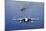 An F-A-18E Super Hornet Flying Above USS John C. Stennis-null-Mounted Photographic Print