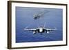 An F-A-18E Super Hornet Flying Above USS John C. Stennis-null-Framed Photographic Print