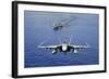 An F-A-18E Super Hornet Flying Above USS John C. Stennis-null-Framed Photographic Print