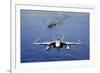 An F-A-18E Super Hornet Flying Above USS John C. Stennis-null-Framed Photographic Print