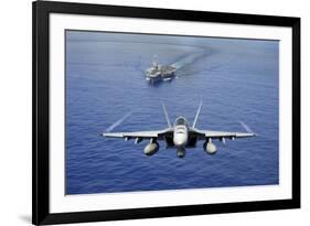 An F-A-18E Super Hornet Flying Above USS John C. Stennis-null-Framed Photographic Print