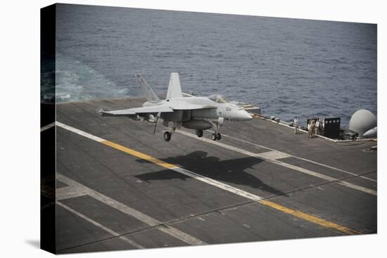 An F-A-18E Super Hornet Lands Aboard the Aircraft Carrier USS Nimitz-null-Stretched Canvas