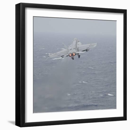 An F-A-18E Super Hornet Launches Off the Flight Deck of USS Nimitz-null-Framed Photographic Print