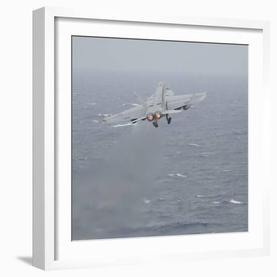 An F-A-18E Super Hornet Launches Off the Flight Deck of USS Nimitz-null-Framed Photographic Print