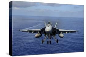 An F-A-18E Super Hornet over the Pacific Ocean-null-Stretched Canvas