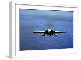 An F-A-18E Super Hornet over the Pacific Ocean-null-Framed Photographic Print