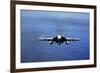 An F-A-18E Super Hornet over the Pacific Ocean-null-Framed Photographic Print