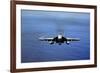 An F-A-18E Super Hornet over the Pacific Ocean-null-Framed Photographic Print