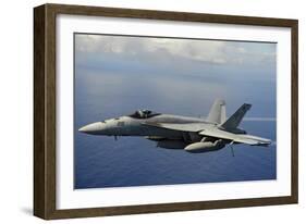 An F-A-18E Super Hornet over the Pacific Ocean-null-Framed Photographic Print