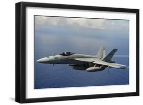 An F-A-18E Super Hornet over the Pacific Ocean-null-Framed Photographic Print