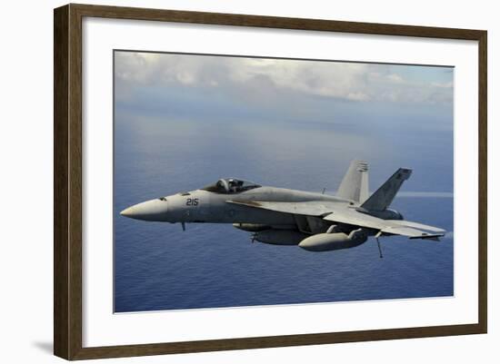 An F-A-18E Super Hornet over the Pacific Ocean-null-Framed Photographic Print