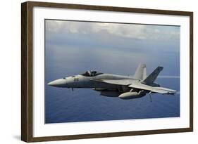 An F-A-18E Super Hornet over the Pacific Ocean-null-Framed Photographic Print