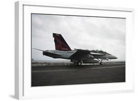 An F-A-18F Super Hornet Launches from USS Nimitz-null-Framed Photographic Print