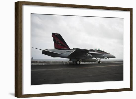 An F-A-18F Super Hornet Launches from USS Nimitz-null-Framed Photographic Print