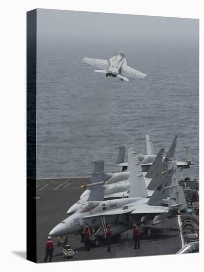 An F-A-18F Super Hornet Taking Off from USS Nimitz-null-Stretched Canvas