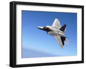 An F/A-22 Raptor Banks During a Training Sortie-Stocktrek Images-Framed Photographic Print