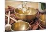 An Image of Some Singing Bowls and a White Orchid-magann-Mounted Photographic Print