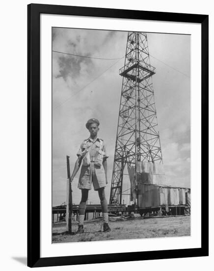 An Indian Army Guard Patroling the Kirkuk Oil Field-Dmitri Kessel-Framed Photographic Print