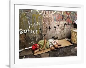 An Indonesian Boy Wearing a Spiderman Mask Sleeps on a Piece of Cardboard-Ed Wray-Framed Photographic Print