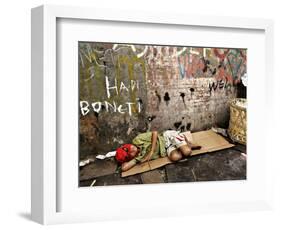 An Indonesian Boy Wearing a Spiderman Mask Sleeps on a Piece of Cardboard-Ed Wray-Framed Photographic Print