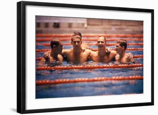 An Intercollegiate Team Locks Arms after Winning Medley Relay, 1964 Summer Olympics, Tokyo, Japa-Art Rickerby-Framed Photographic Print