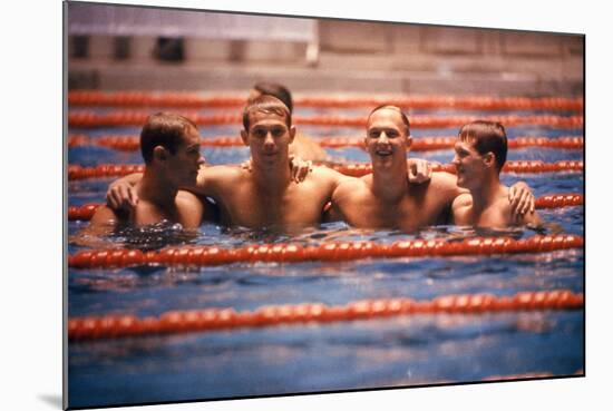 An Intercollegiate Team Locks Arms after Winning Medley Relay, 1964 Summer Olympics, Tokyo, Japa-Art Rickerby-Mounted Photographic Print