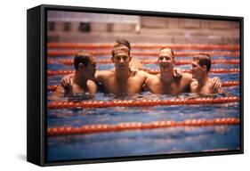 An Intercollegiate Team Locks Arms after Winning Medley Relay, 1964 Summer Olympics, Tokyo, Japa-Art Rickerby-Framed Stretched Canvas