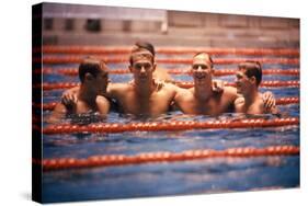 An Intercollegiate Team Locks Arms after Winning Medley Relay, 1964 Summer Olympics, Tokyo, Japa-Art Rickerby-Stretched Canvas