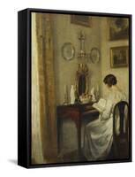 An Interior with a Girl Reading at a Desk-Carl Holsoe-Framed Stretched Canvas