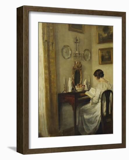 An Interior with a Girl Reading at a Desk-Carl Holsoe-Framed Giclee Print