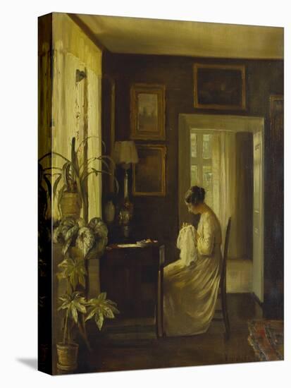 An Interior with a Woman Sewing-Carl Holsoe-Stretched Canvas
