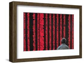 An Investor Looks at an Electronic Board Showing Stock Information, Shanxi Province-Stringer Shanghai-Framed Photographic Print