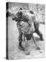 An Iranian Performace of a Man Wrestling a Bear in Public-Dmitri Kessel-Stretched Canvas