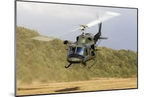 An Italian Air Force Ab-212 Ico Helicopter Departs the Landing Zone, Italy-null-Mounted Photographic Print