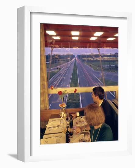 An Italian Couple Take their Supper in One of the Highway-Spanning Restaurant of the Pavesi Chain-Ralph Crane-Framed Photographic Print