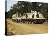 An M-88 Recovery Vehicle Begins to Tow an M992 Field Artillery Ammunition Supply Vehicle-Stocktrek Images-Stretched Canvas