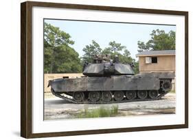 An M1A1 Abrams Tank Takes a Defensive Position on a Simulated Enemy Town-null-Framed Photographic Print