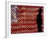 An Man Wearing a Cowboy Hat Walks Past an American Flag Light Display-Brandi Simons-Framed Photographic Print