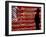 An Man Wearing a Cowboy Hat Walks Past an American Flag Light Display-Brandi Simons-Framed Photographic Print