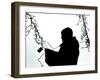 An Man Wires Christmas Lights-null-Framed Photographic Print