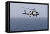 An Mh-60R Sea Hawk Helicopter Flies over the Gulf of Oman-null-Framed Stretched Canvas