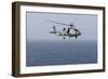An Mh-60R Sea Hawk Helicopter Flies over the Gulf of Oman-null-Framed Photographic Print