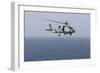 An Mh-60R Sea Hawk Helicopter Flies over the Gulf of Oman-null-Framed Photographic Print