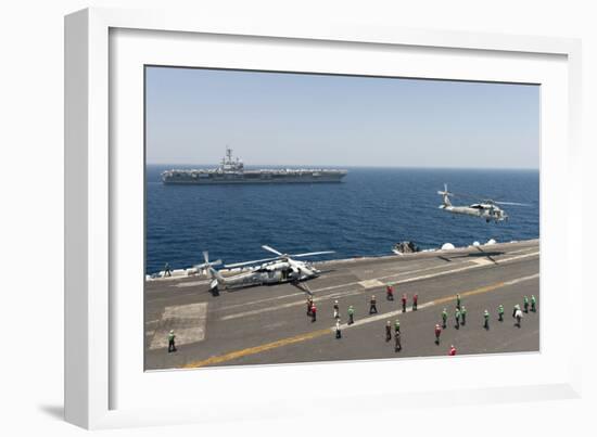 An Mh-60R Sea Hawk Helicopter Launches from USS Harry S. Truman-null-Framed Photographic Print