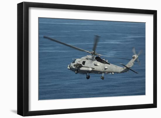 An Mh-60R Sea Hawk Maneuvers over the South China Sea-null-Framed Photographic Print