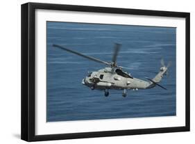 An Mh-60R Sea Hawk Maneuvers over the South China Sea-null-Framed Photographic Print