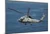 An Mh-60R Sea Hawk Maneuvers over the South China Sea-null-Mounted Photographic Print