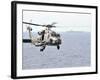 An MH-60R Seahawk Helicopter in Flight over the Pacific Ocean-Stocktrek Images-Framed Photographic Print