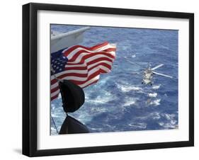 An Mh-60S Sea Hawk Carries Supplies During a Replenishment at Sea-null-Framed Photographic Print